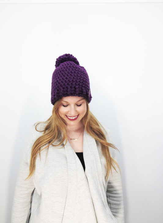 The Winter Island Pom Pom Hat in Purple